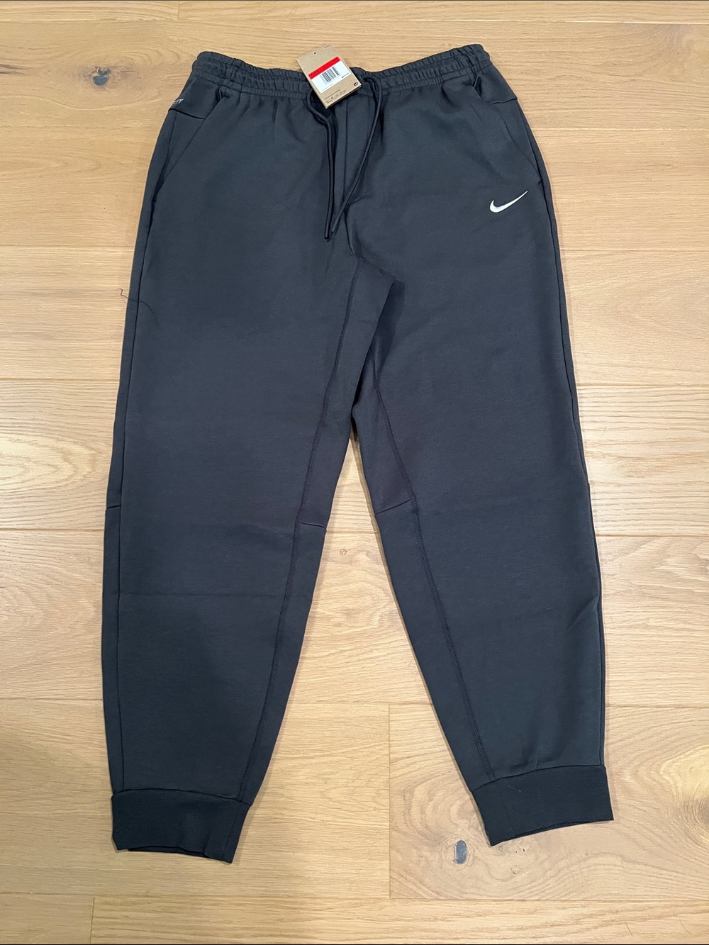 Nike Charcoal Gray Jogger Pants with White Swoosh